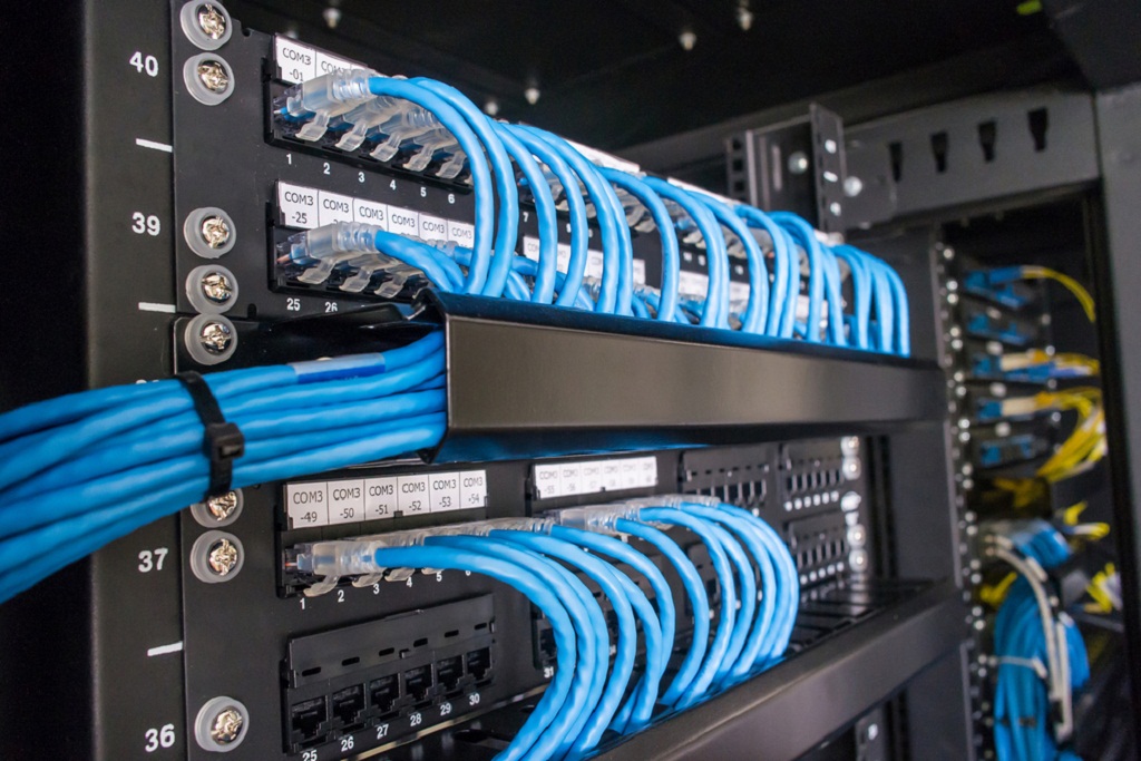 Back view of hackers working on making a dangerous malware